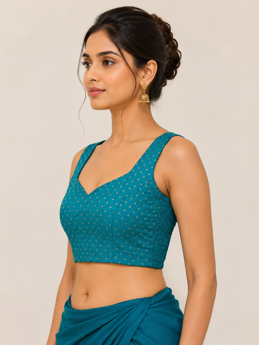 Emerald Green Brocade Sleeveless Blouse with Gold Zari Buttas with Side Shirring
