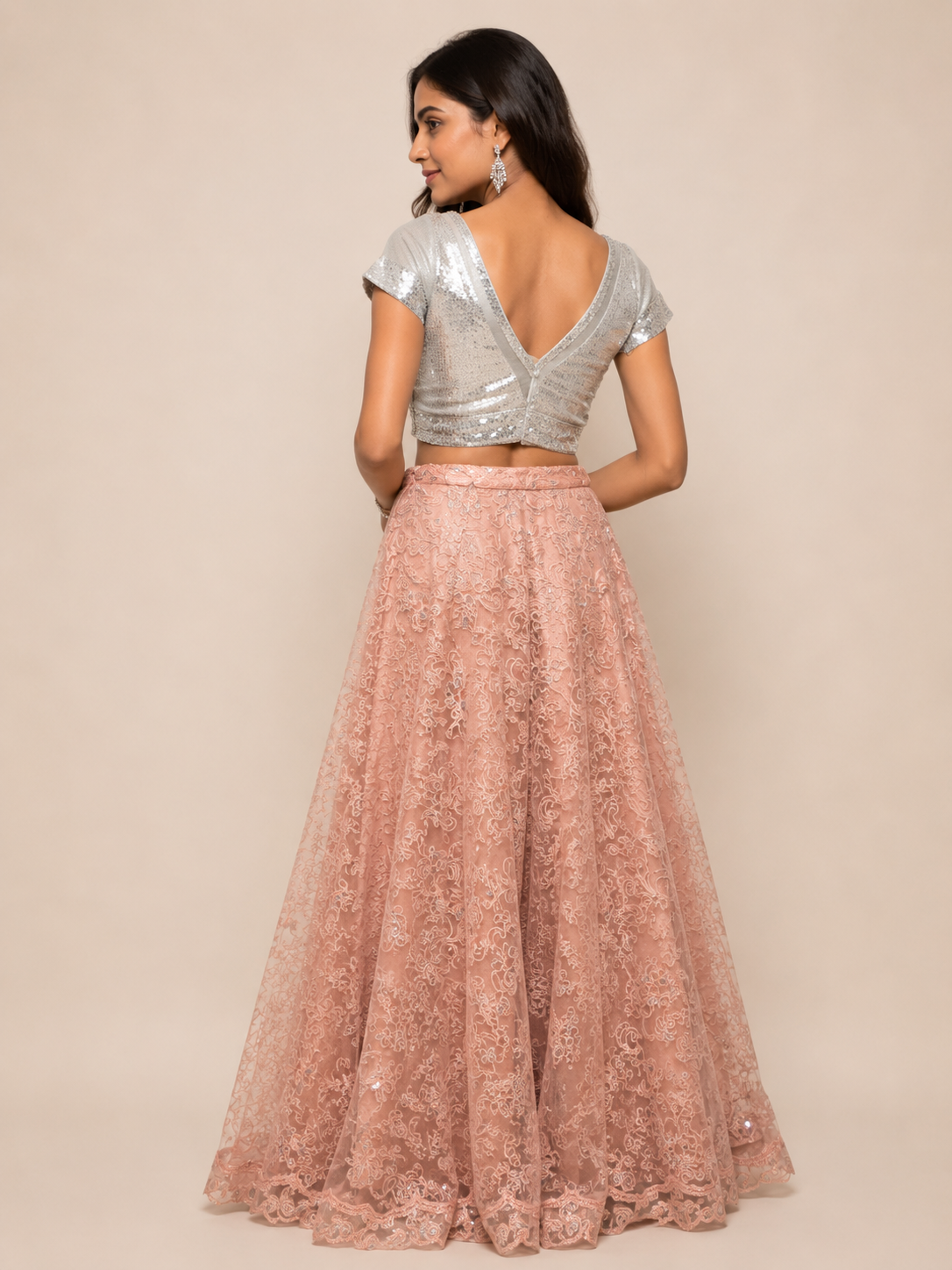 Peach self Embroidered Skirt and Silver sequined Crop top for wedding and festive wear