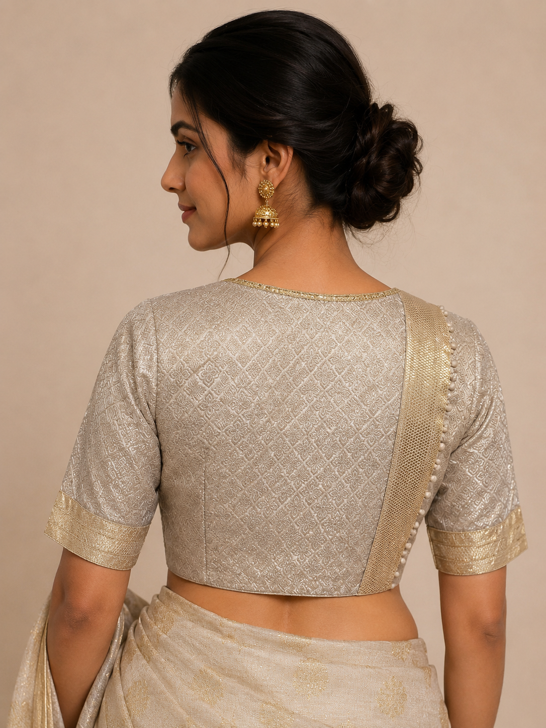 Silver Woven Blouse with Cutdana Embellished Neckline for festive and wedding wear