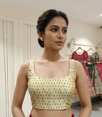 Sleeveless Cream Ikkat Blouse with Side Shirring for wedding and festive wear