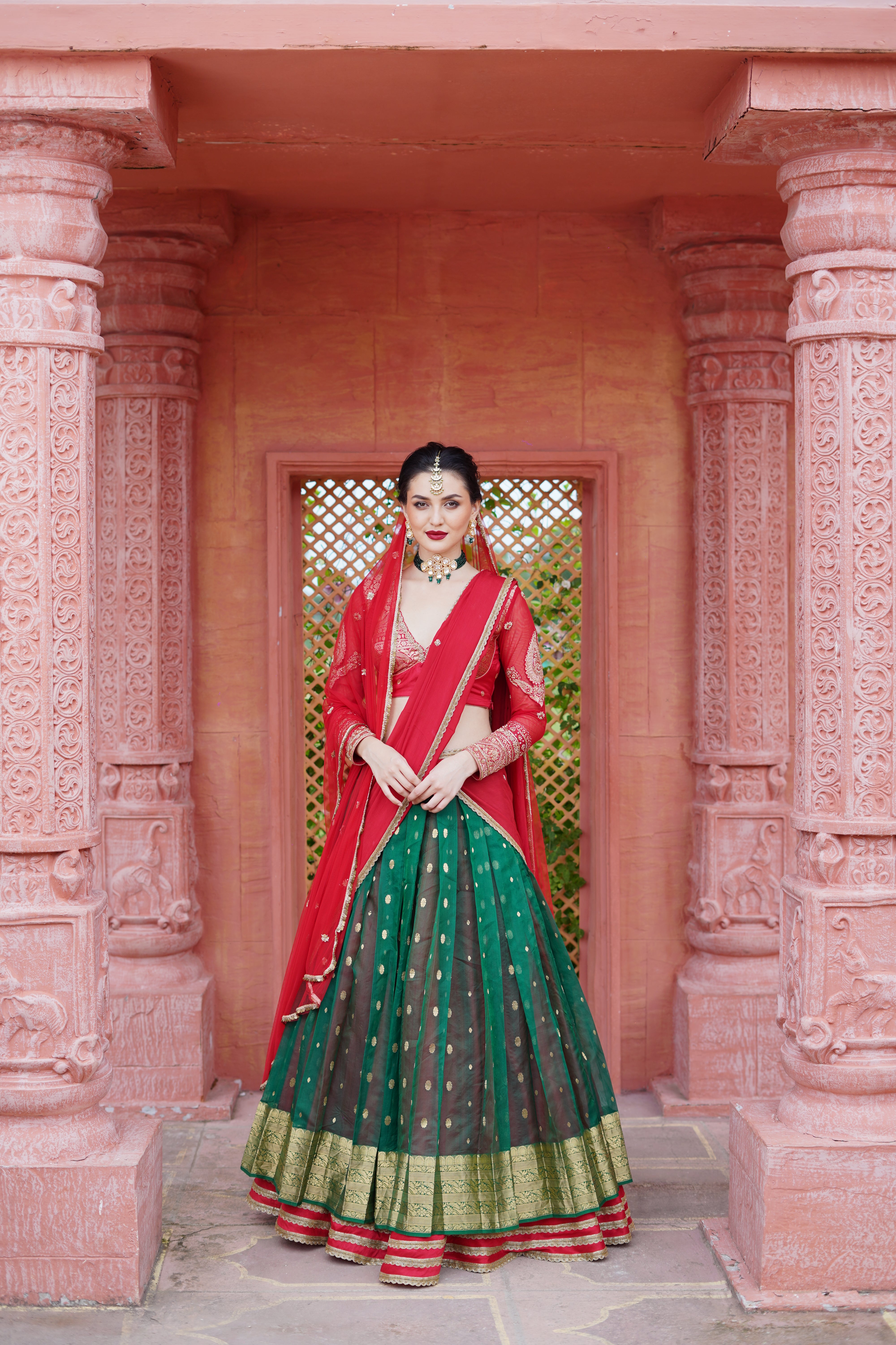 Bottle Green Lehenga with Red Blouse