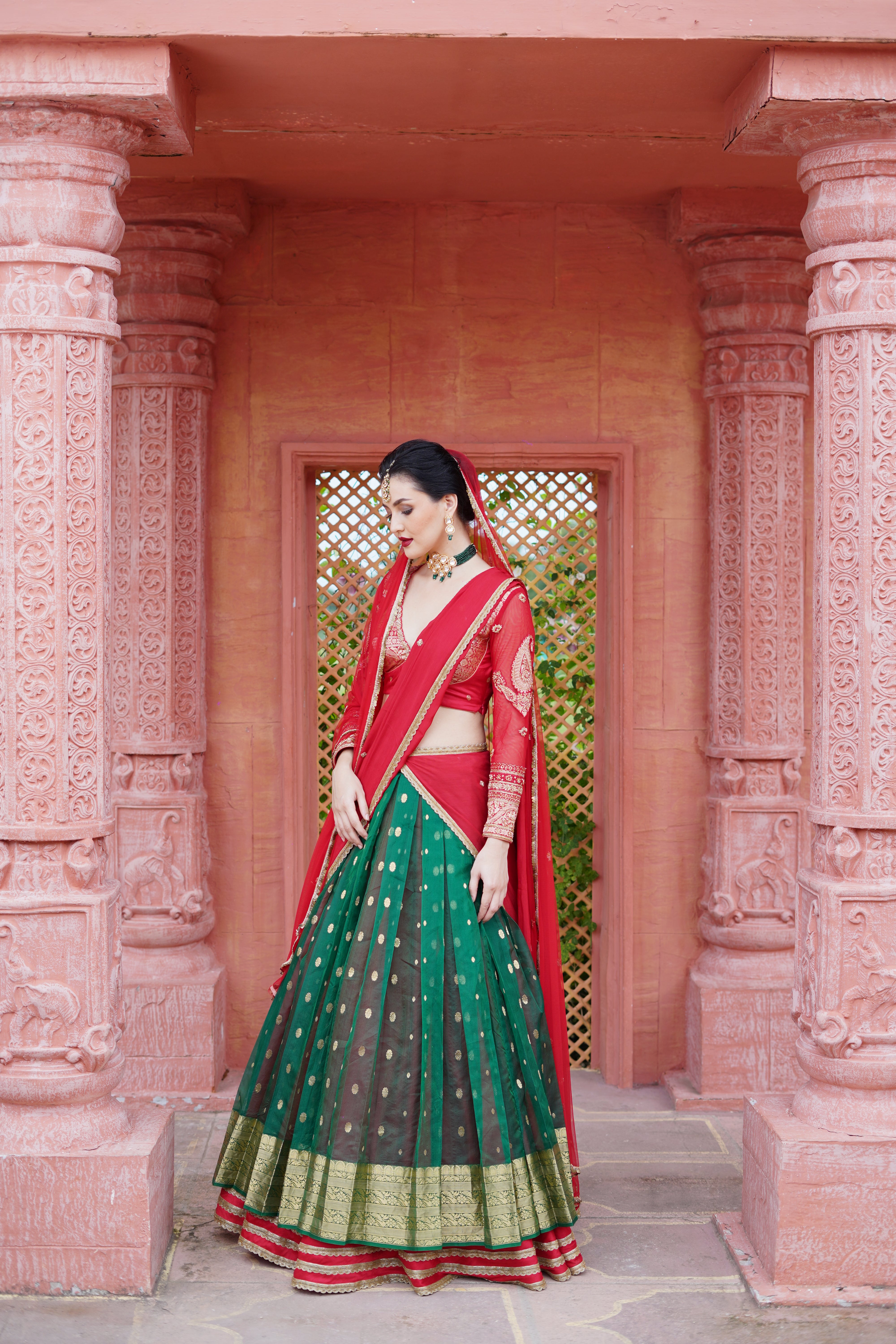 Bottle Green Lehenga with Red Blouse