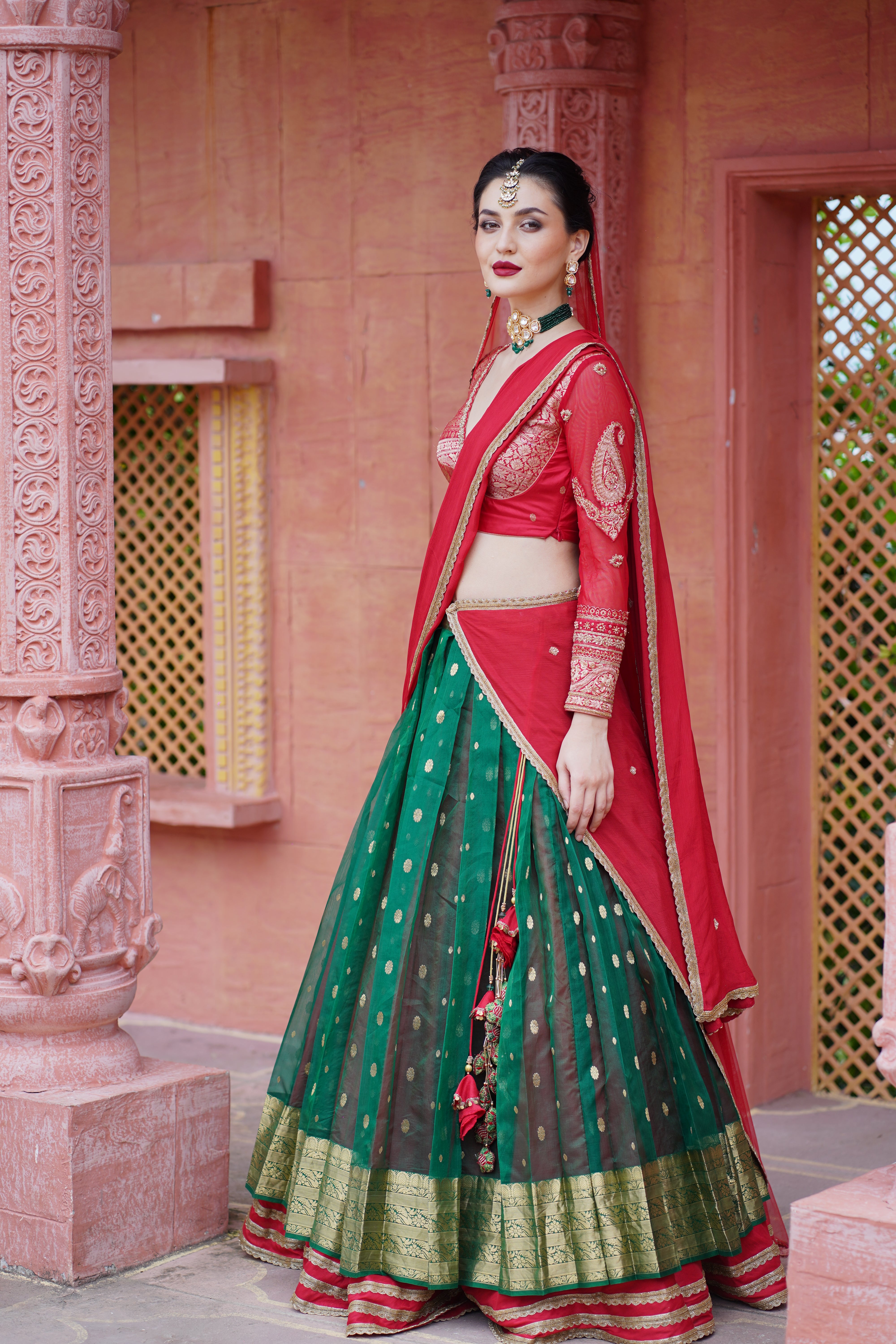 Bottle Green Lehenga with Red Blouse