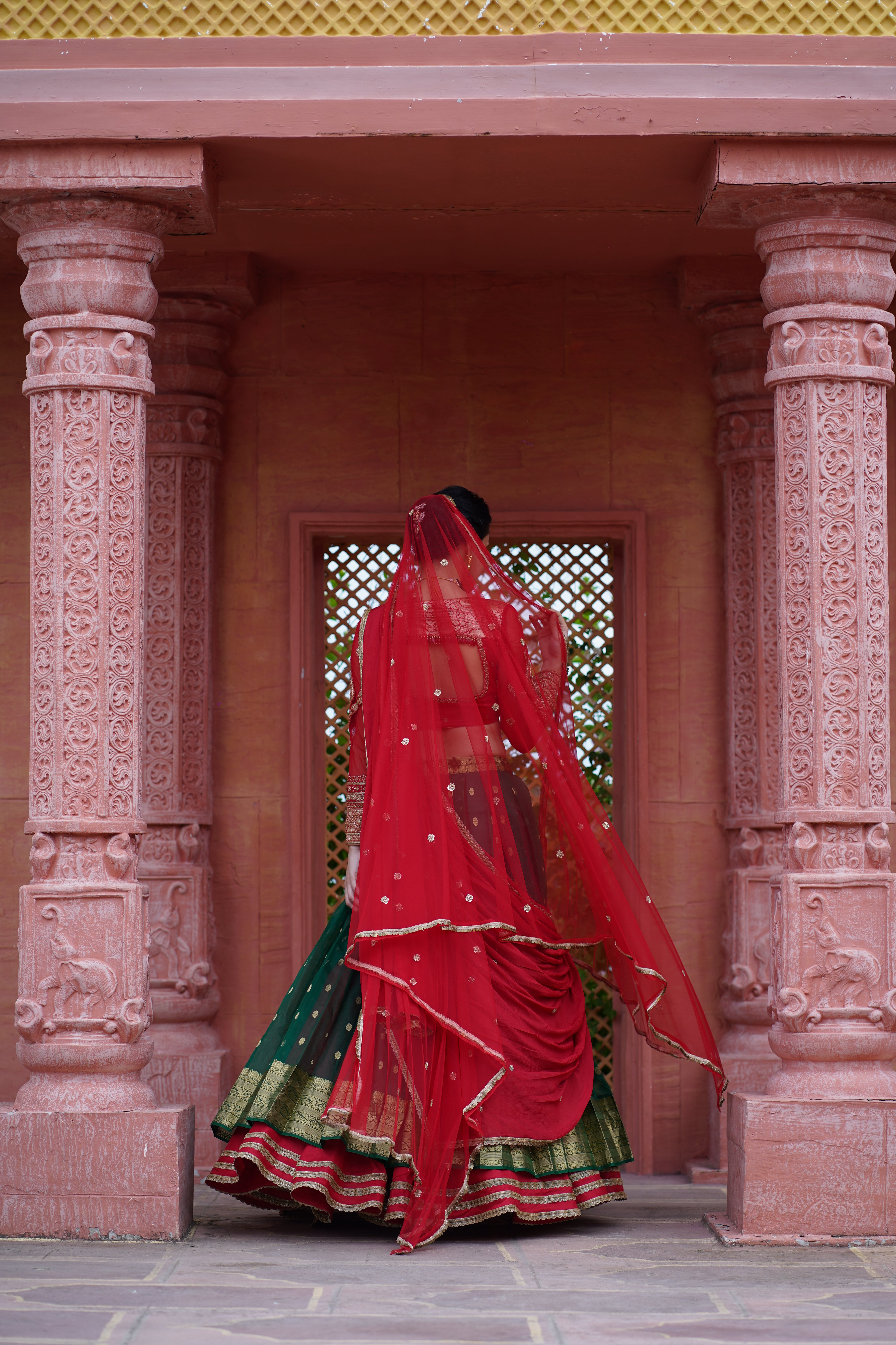 Bottle Green Lehenga with Red Blouse