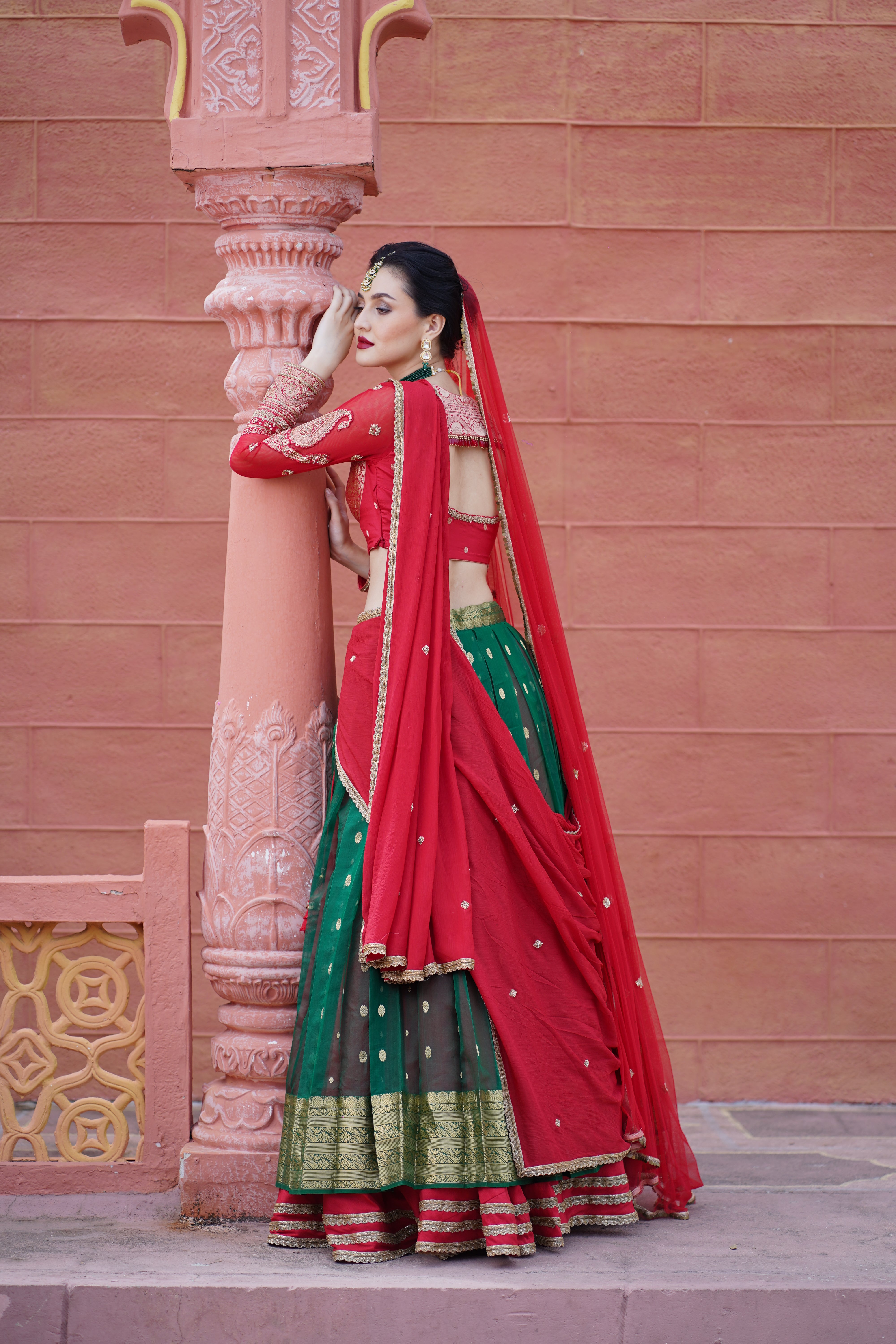 Bottle Green Lehenga with Red Blouse