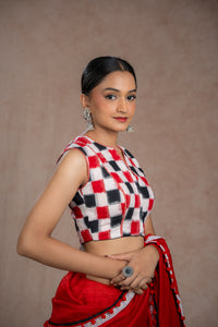 Black and Red Double Ikkat Sleeveless Blouse for wedding and festive wear