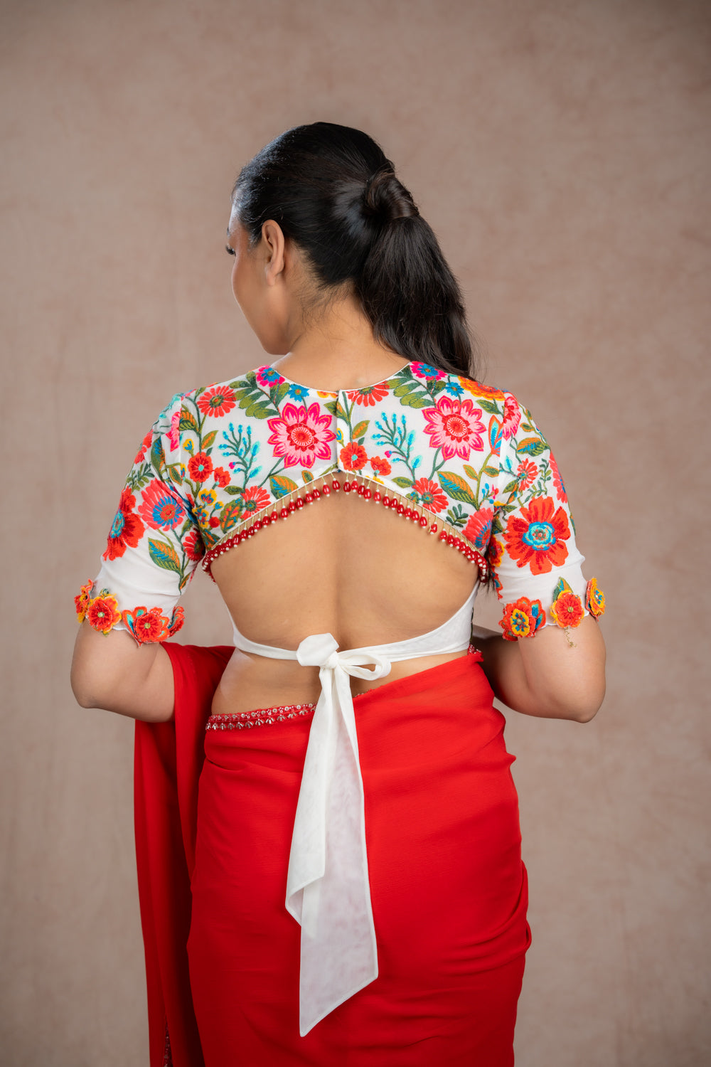 Cream Blouse with Multi-color Thread Work