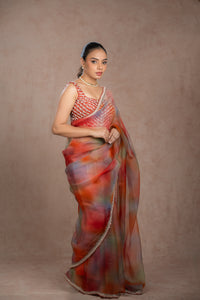 Multi-colored organza saree for wedding and festive wear